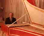 Willard A. Palmer at his harpsichord 'Big Red'